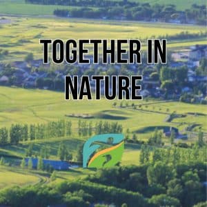 An aerial image of Hespeler Park in Niverville, MB with text of the program name Together in Nature, and the Niverville Rec logo icon. 
